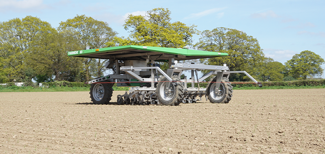 Four wheeled FarmDroid FD20 weeding onions by solar-power